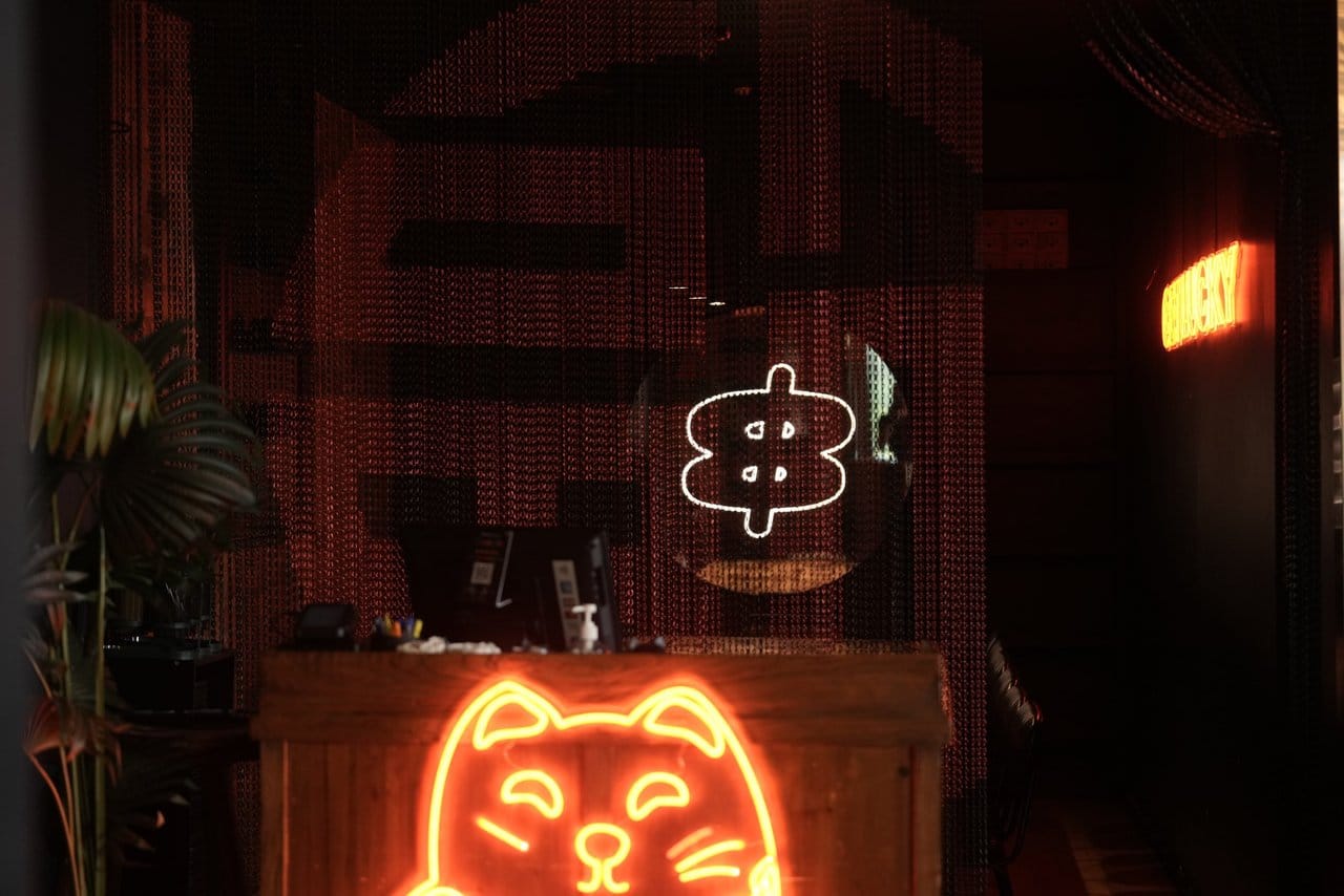 Inside Lucky 8 — warm lanterns and the lucky cat